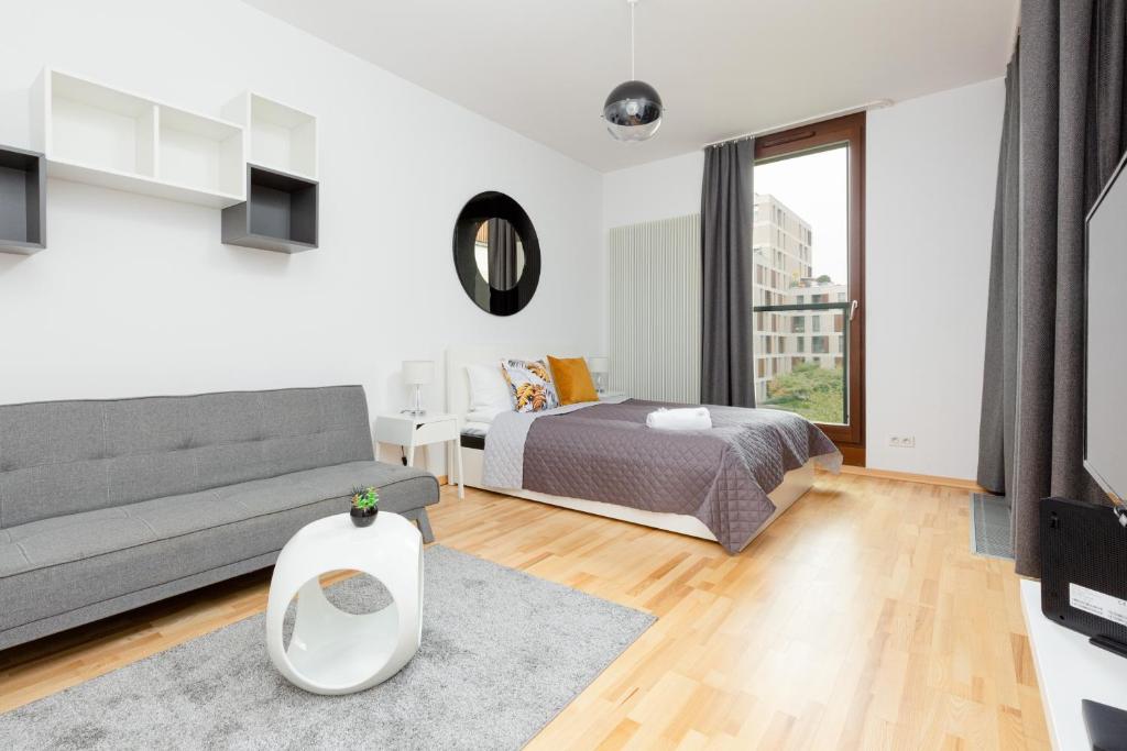 Posedenie v ubytovaní 19 Dzielnica Apartamenty Warszawa by Noclegi Renters