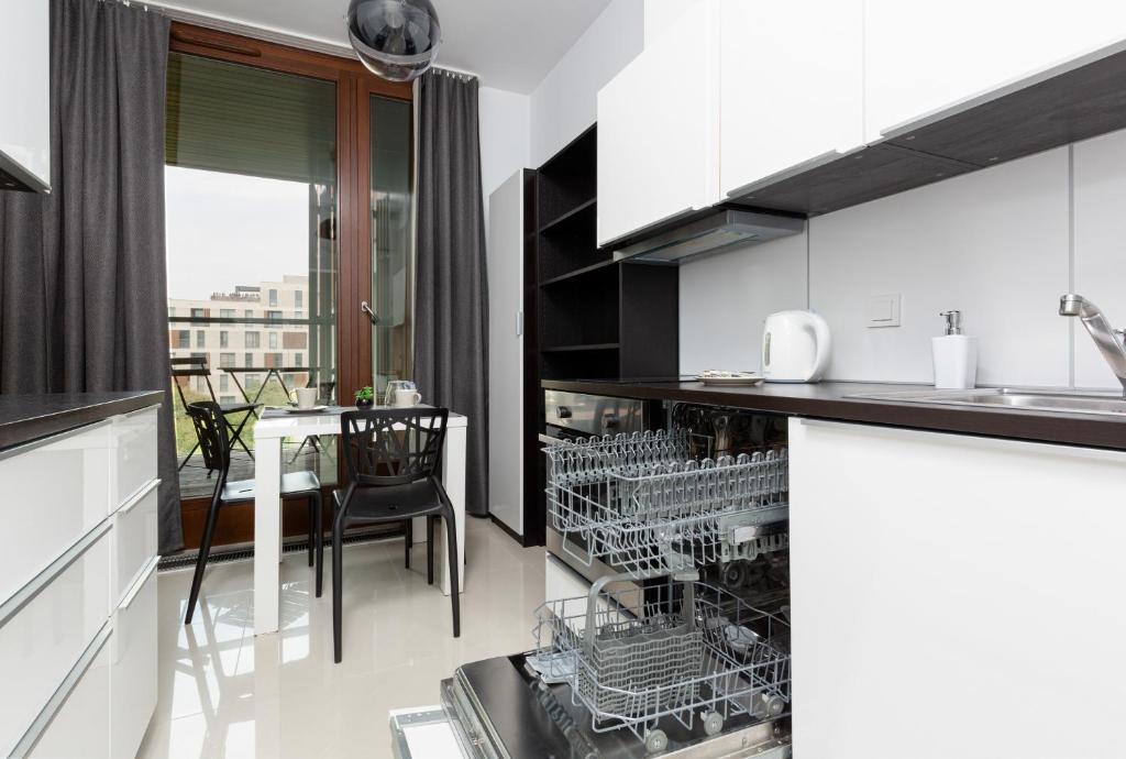 Balkón alebo terasa v ubytovaní 19 Dzielnica Apartamenty Warszawa by Noclegi Renters