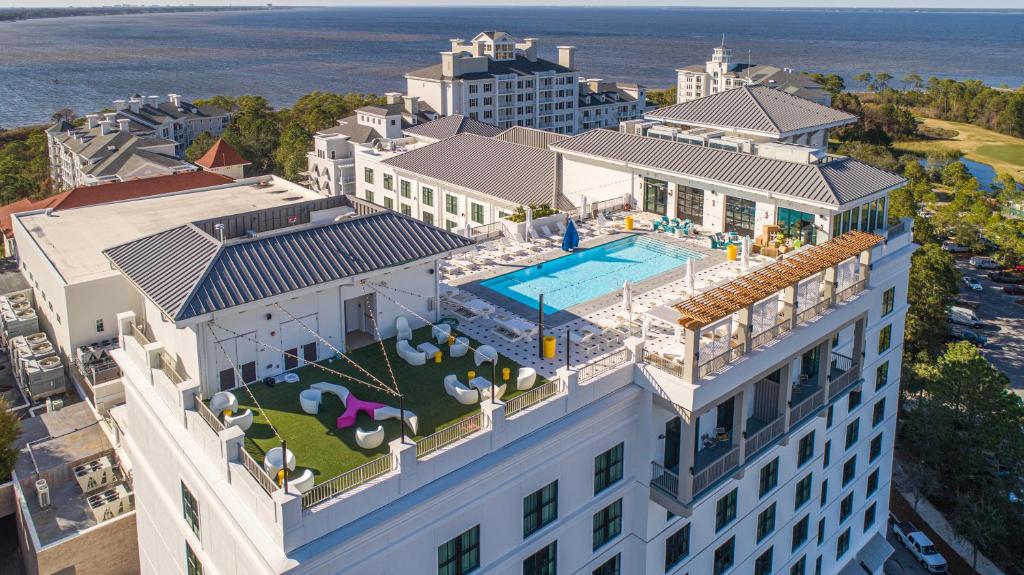 
a large building with a view of the ocean at Hotel Effie Sandestin in Destin
