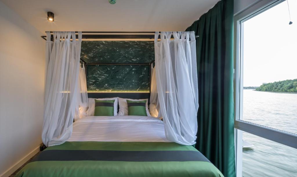 Postel nebo postele na pokoji v ubytování Joy 5 Hotel & SPA