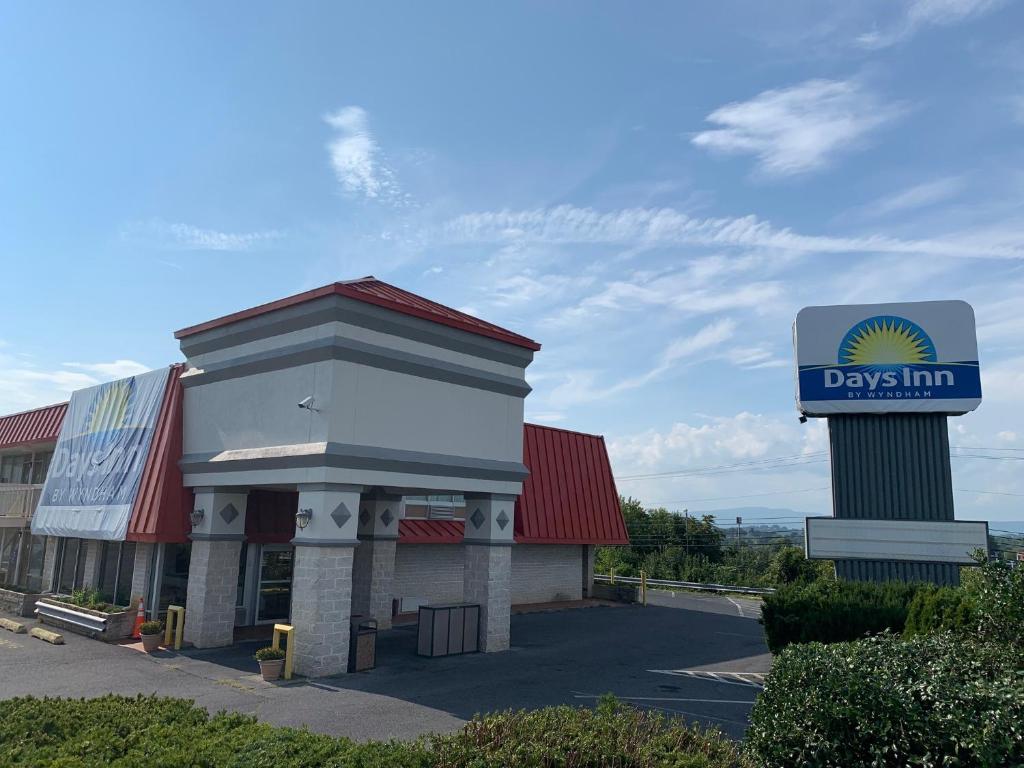 a day inn with a sign in front of it at Days Inn by Wyndham Harrisonburg in Harrisonburg