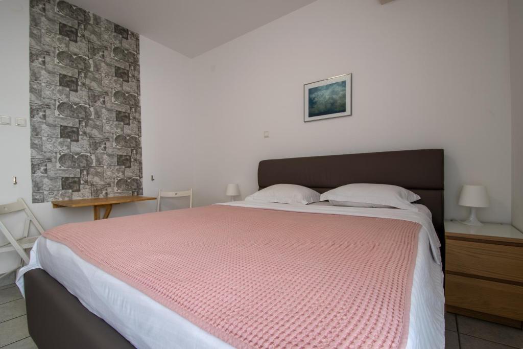 Posteľ alebo postele v izbe v ubytovaní Apartments Lantina