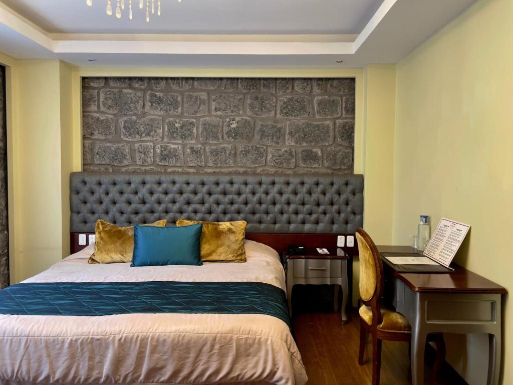 Postel nebo postele na pokoji v ubytování Sangay Spa Hotel