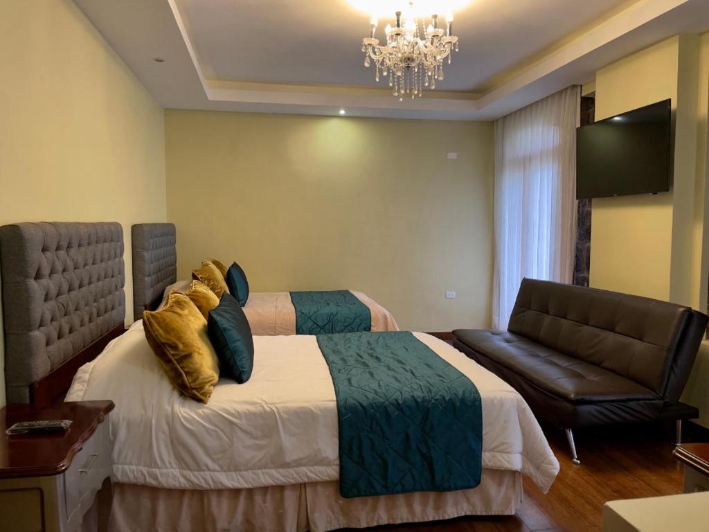 Postel nebo postele na pokoji v ubytování Sangay Spa Hotel