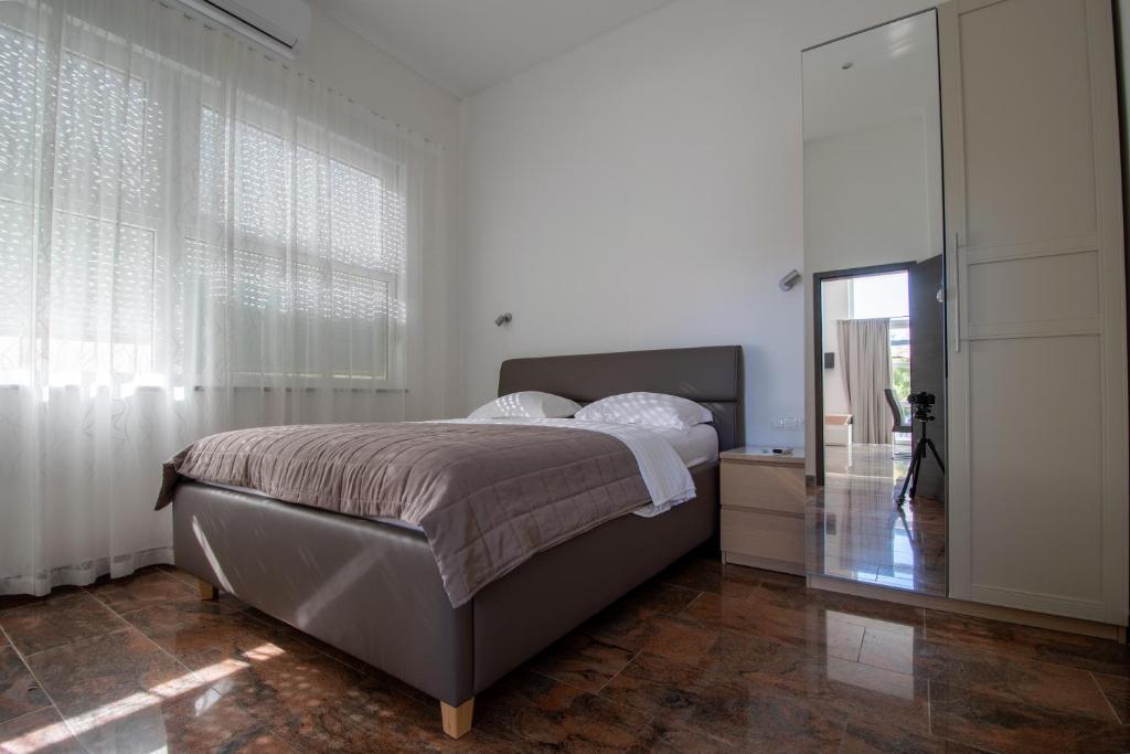 Posteľ alebo postele v izbe v ubytovaní Apartments Lantina