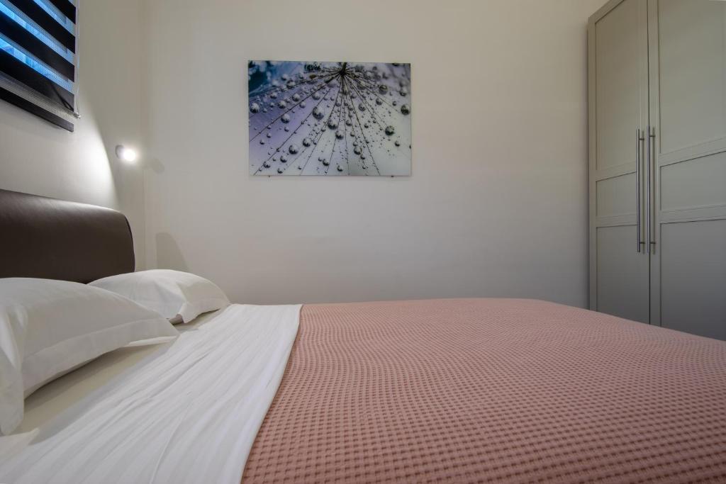 Posteľ alebo postele v izbe v ubytovaní Apartments Lantina