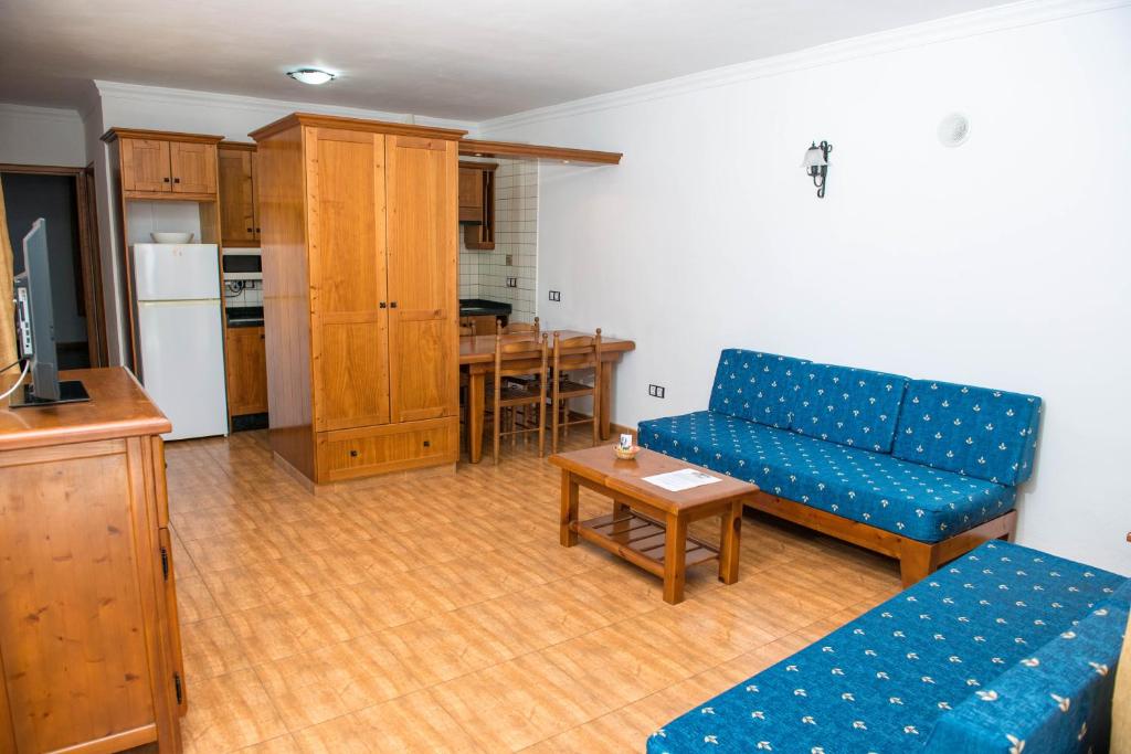 Kuchyň nebo kuchyňský kout v ubytování Apartamentos La Palmera