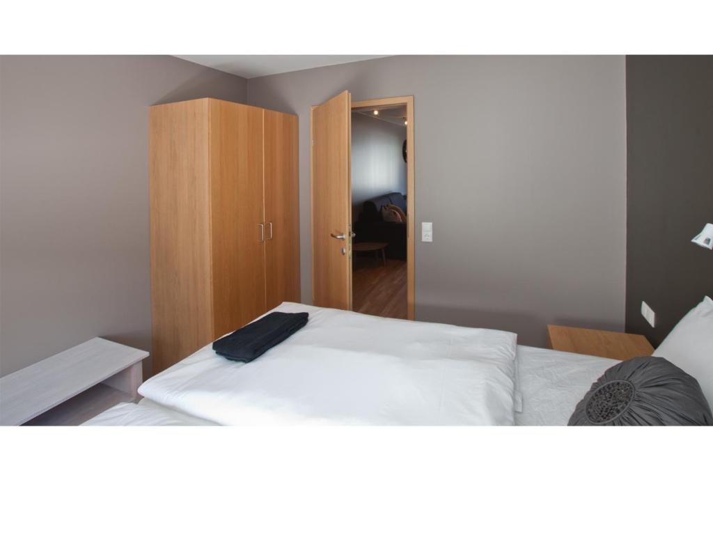 Postel nebo postele na pokoji v ubytování Torg Guest House