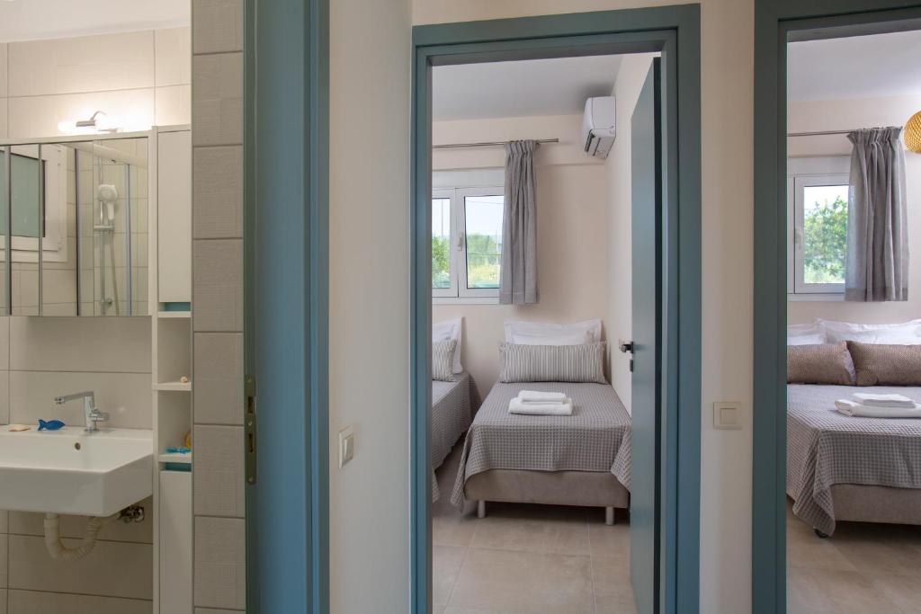 Posteľ alebo postele v izbe v ubytovaní Kymata Apartment Ierapetra
