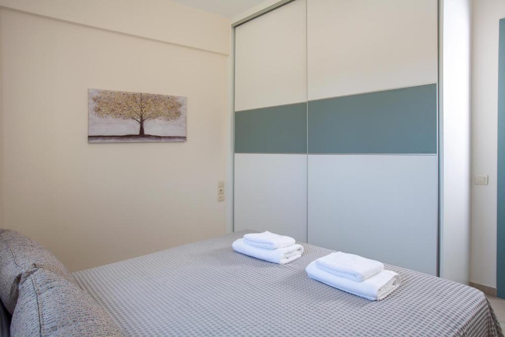 Posteľ alebo postele v izbe v ubytovaní Kymata Apartment Ierapetra