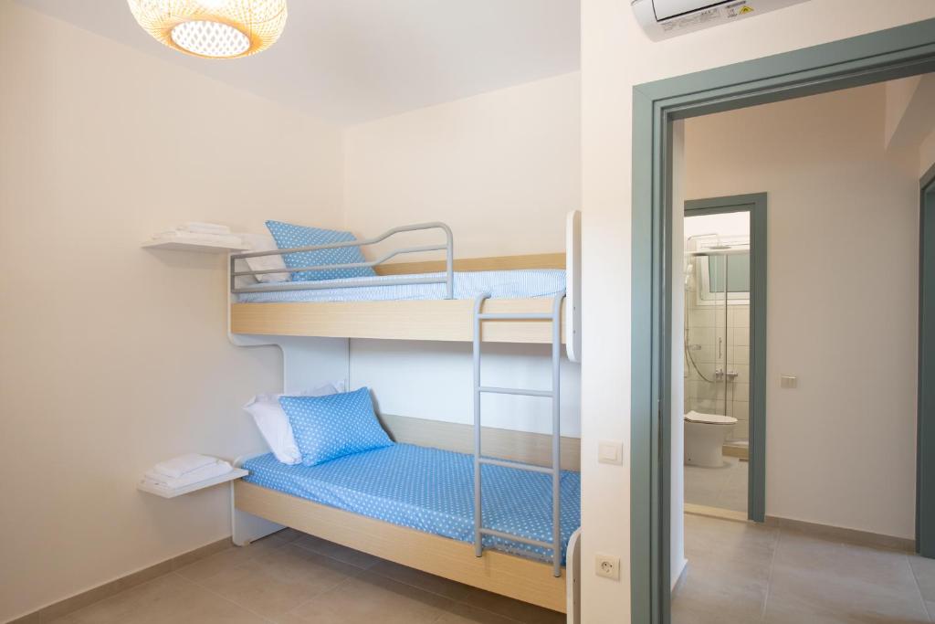Posteľ alebo postele v izbe v ubytovaní Kymata Apartment Ierapetra