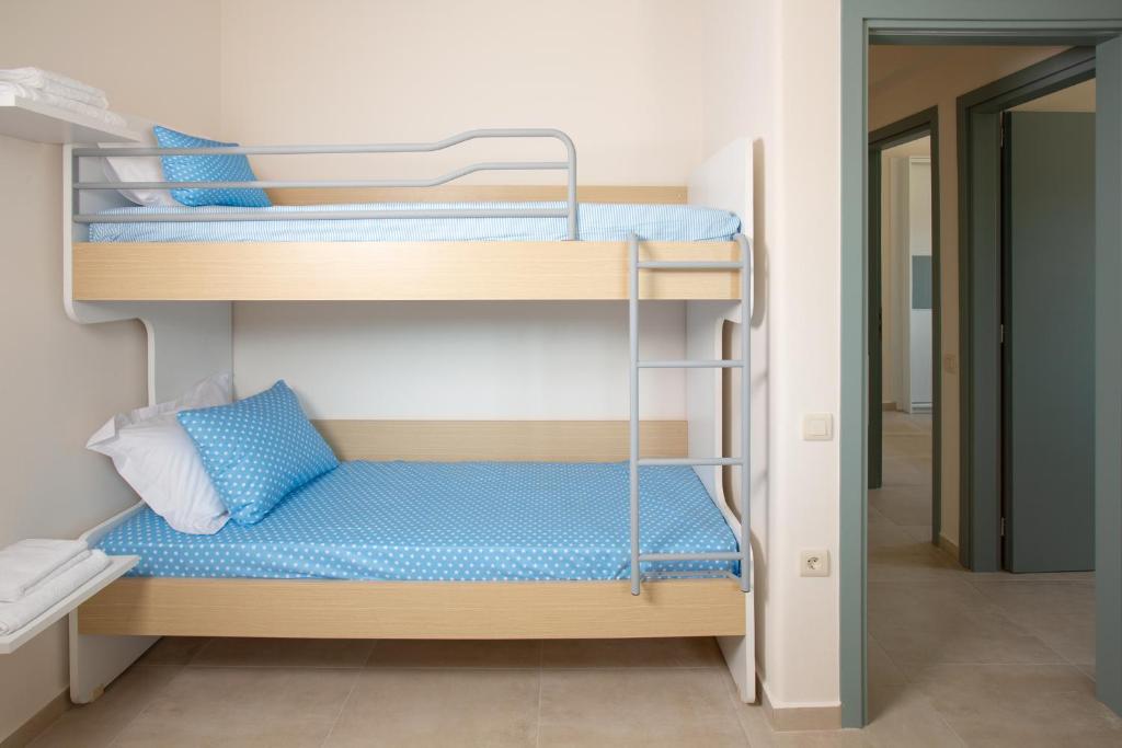 Posteľ alebo postele v izbe v ubytovaní Kymata Apartment Ierapetra
