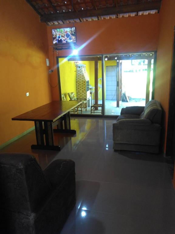 Posezení v ubytování Casa de temporada Lindas Cachoeiras 10
