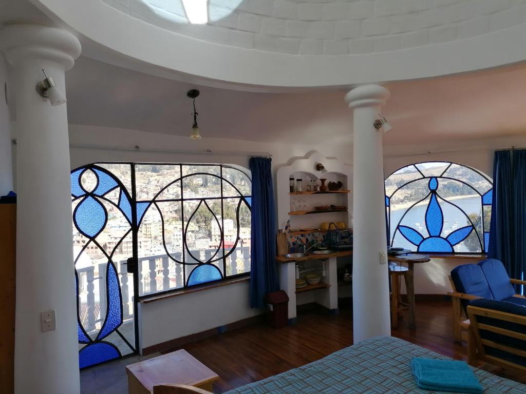 Postel nebo postele na pokoji v ubytování Hostal Las Olas