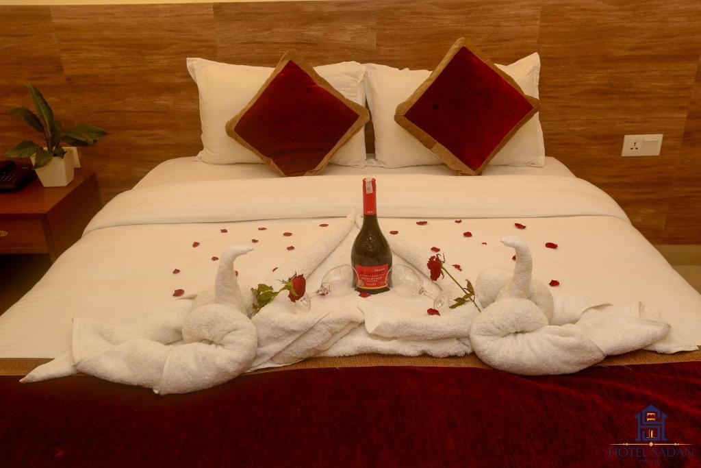 Katil atau katil-katil dalam bilik di Hotel Sadan