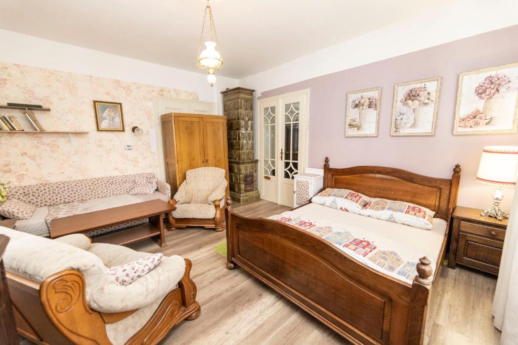 Postel nebo postele na pokoji v ubytování Venkovské apartmány Tiché pastviny