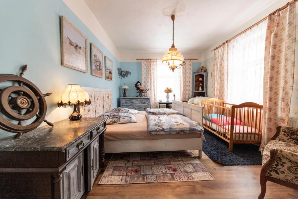 Postel nebo postele na pokoji v ubytování Venkovské apartmány Tiché pastviny