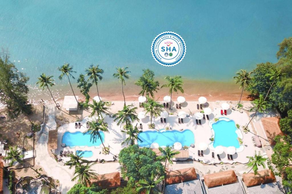 an aerial view of the beach at a resort at Villa Cha-Cha Krabi Beachfront Resort in Ao Nam Mao