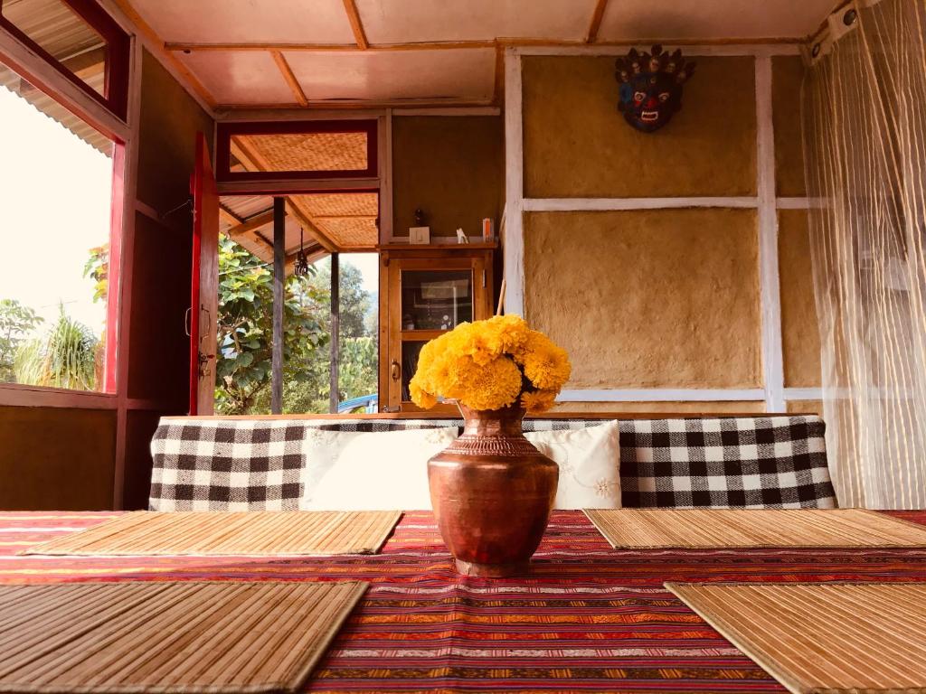 Posezení v ubytování PaliGhar Farmstay