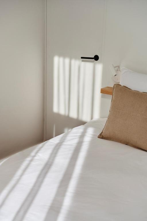 Postel nebo postele na pokoji v ubytování Edgar Guesthouse