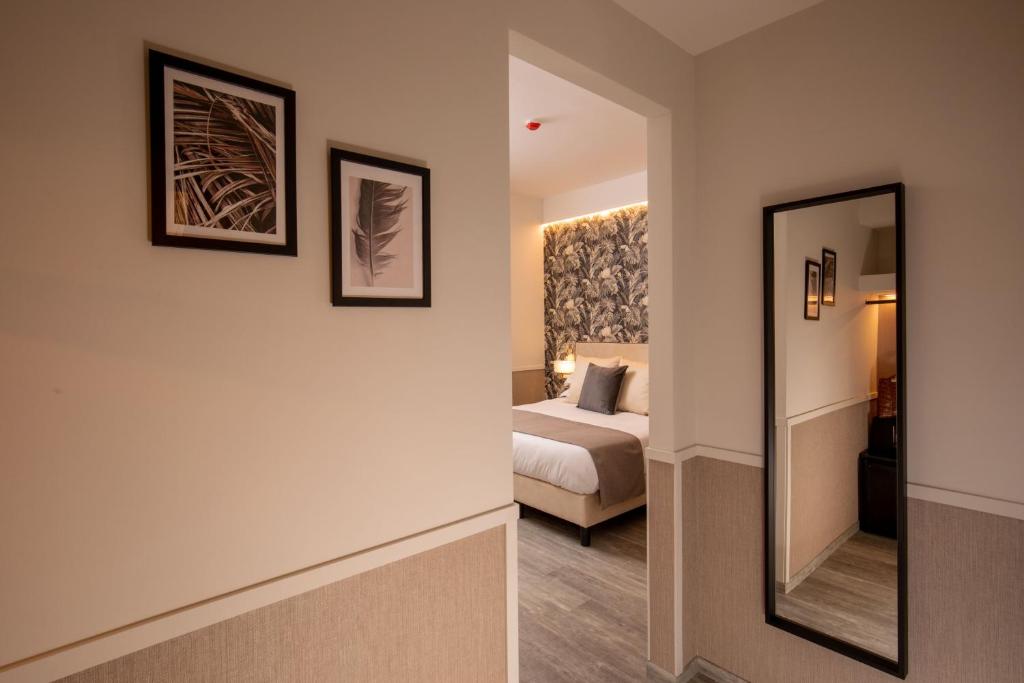 Letto o letti in una camera di Sophie Terrace Hotel