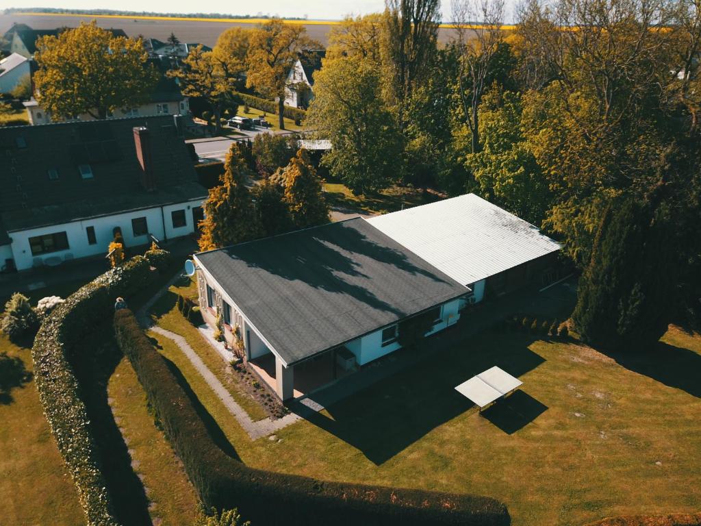 an overhead view of a house with a gray roof at Apartement Rosenbusch in Klausdorf Mecklenburg Vorpommern