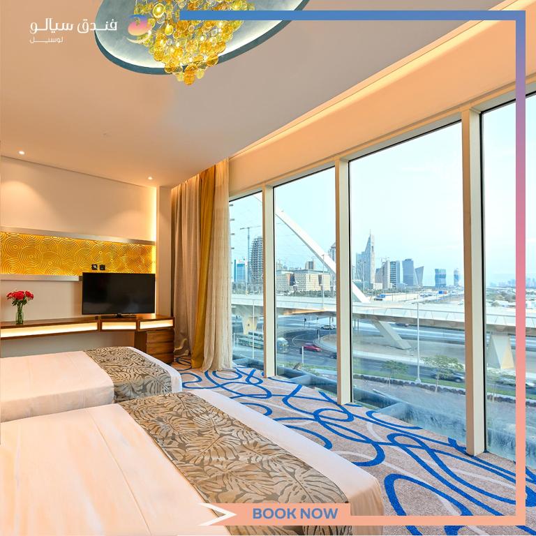 Katil atau katil-katil dalam bilik di Cielo Hotel Lusail Qatar
