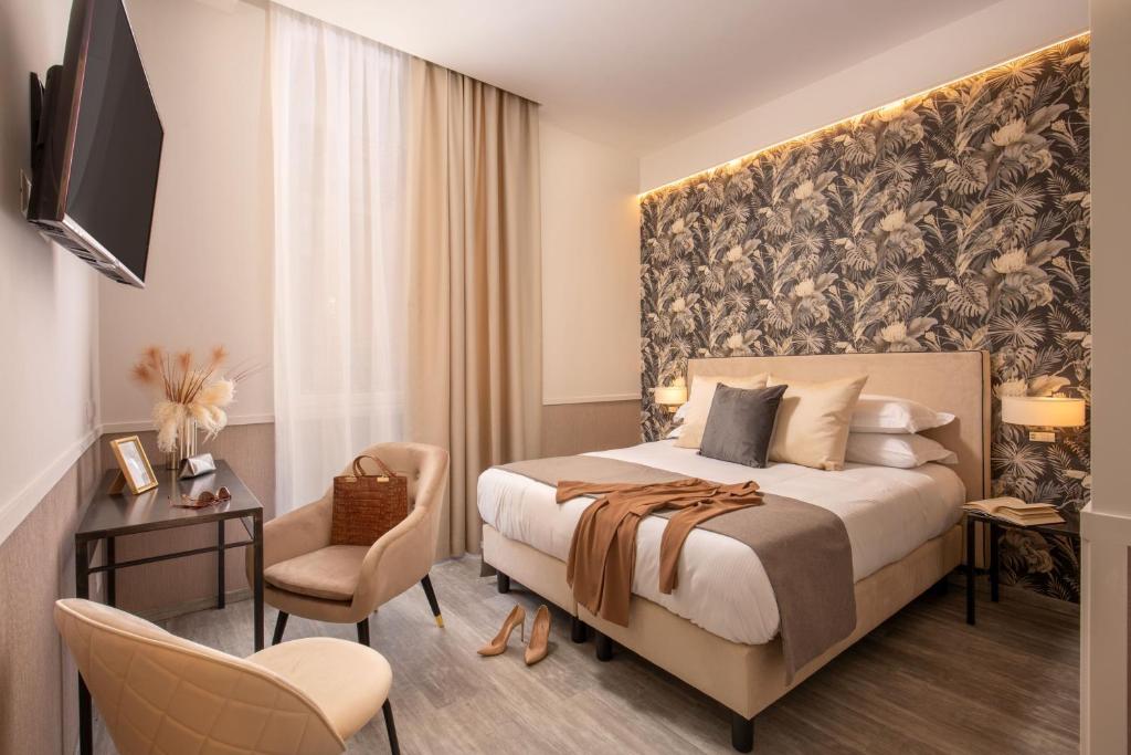 Letto o letti in una camera di Sophie Terrace Hotel