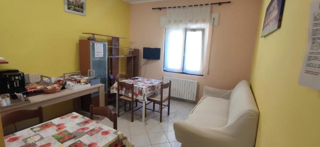 TV a/nebo společenská místnost v ubytování Complesso turistico Aurora - camere B&B