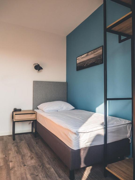 Postel nebo postele na pokoji v ubytování Sabotin, Hotel & Restaurant