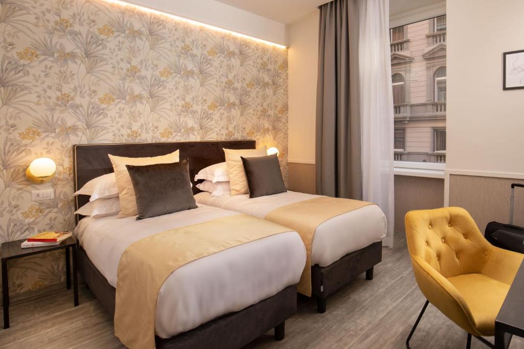 Letto o letti in una camera di Sophie Terrace Hotel