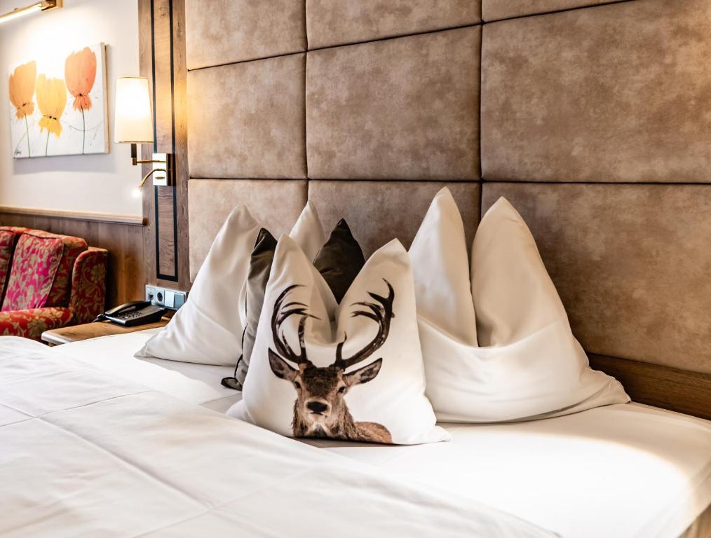 Postel nebo postele na pokoji v ubytování Hotel Hubertushof