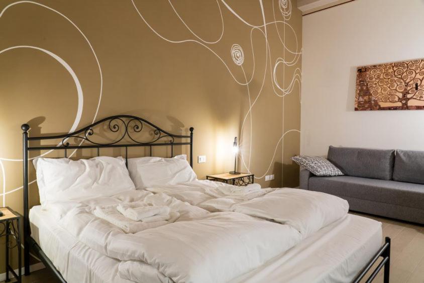 Postel nebo postele na pokoji v ubytování Casa Giardini