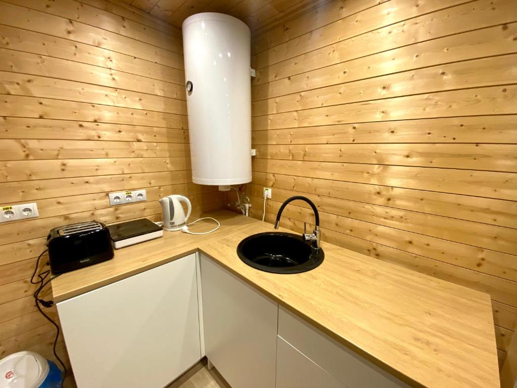 Kuchyň nebo kuchyňský kout v ubytování Pixel - Tiny Campus