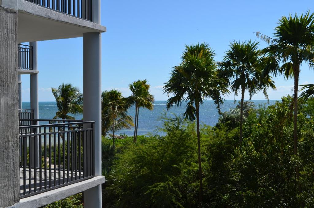 a view of the ocean from the balcony of a house at Ocean Hideaway on the Atlantic in Key West