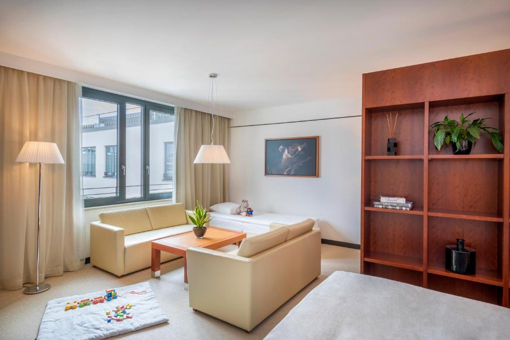 Postel nebo postele na pokoji v ubytování Meliá Berlin