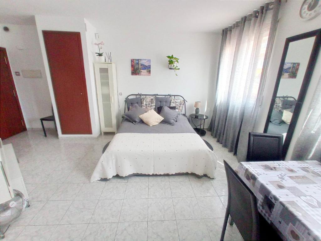 Postel nebo postele na pokoji v ubytování Estudio Paz