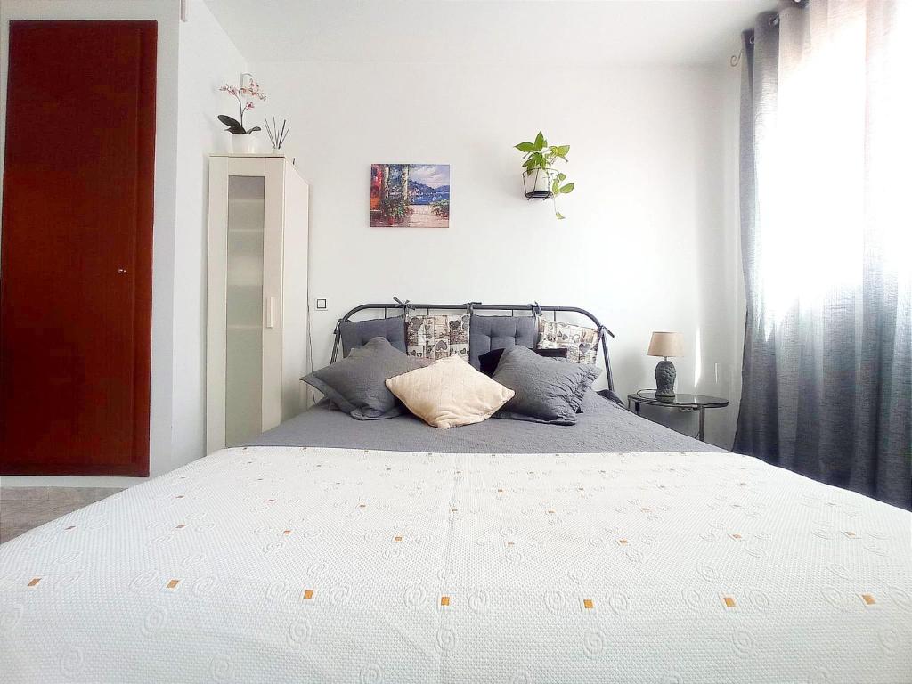 Postel nebo postele na pokoji v ubytování Estudio Paz