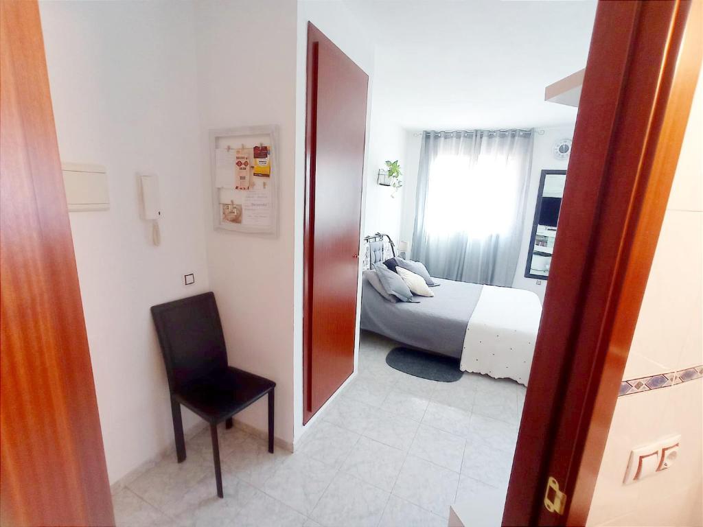 Postel nebo postele na pokoji v ubytování Estudio Paz