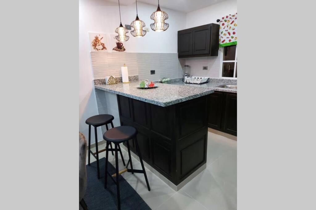 Kuchyň nebo kuchyňský kout v ubytování 4to nivel 2 habitaciones 2 baños Alma Rosa I