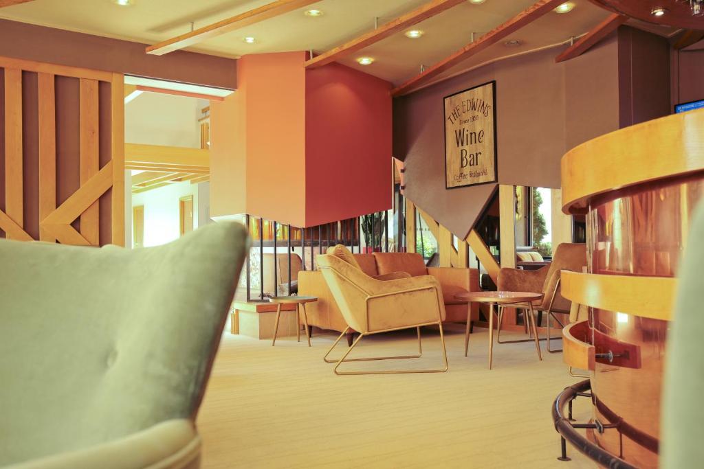 Posezení v ubytování Logis Hostellerie D'Aussois