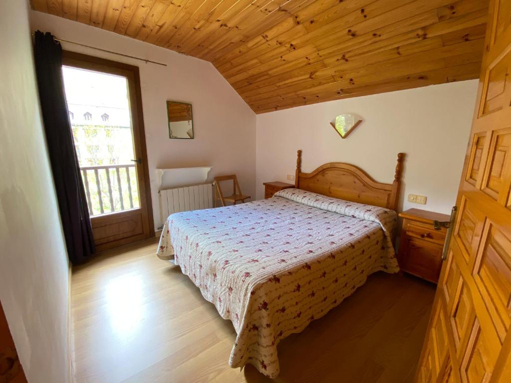 Postel nebo postele na pokoji v ubytování Casa Rural Era de Ferro