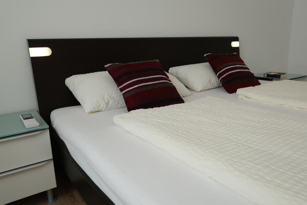 Postel nebo postele na pokoji v ubytování Modern Home Check-in & chill down auf 65 qm²