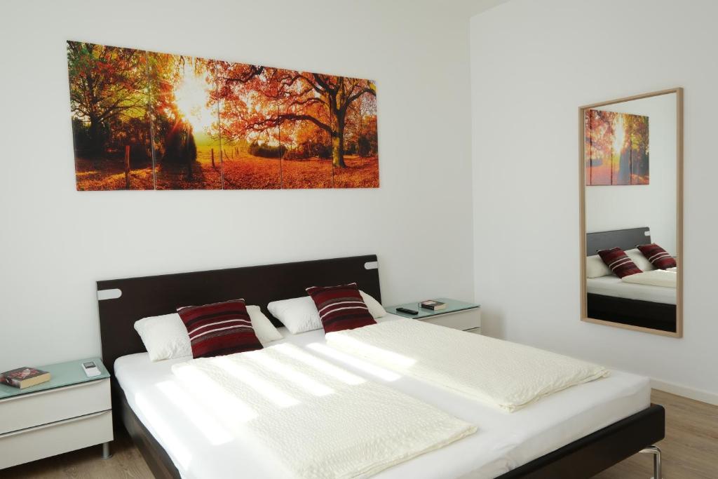 Postel nebo postele na pokoji v ubytování Modern Home Check-in & chill down auf 65 qm²