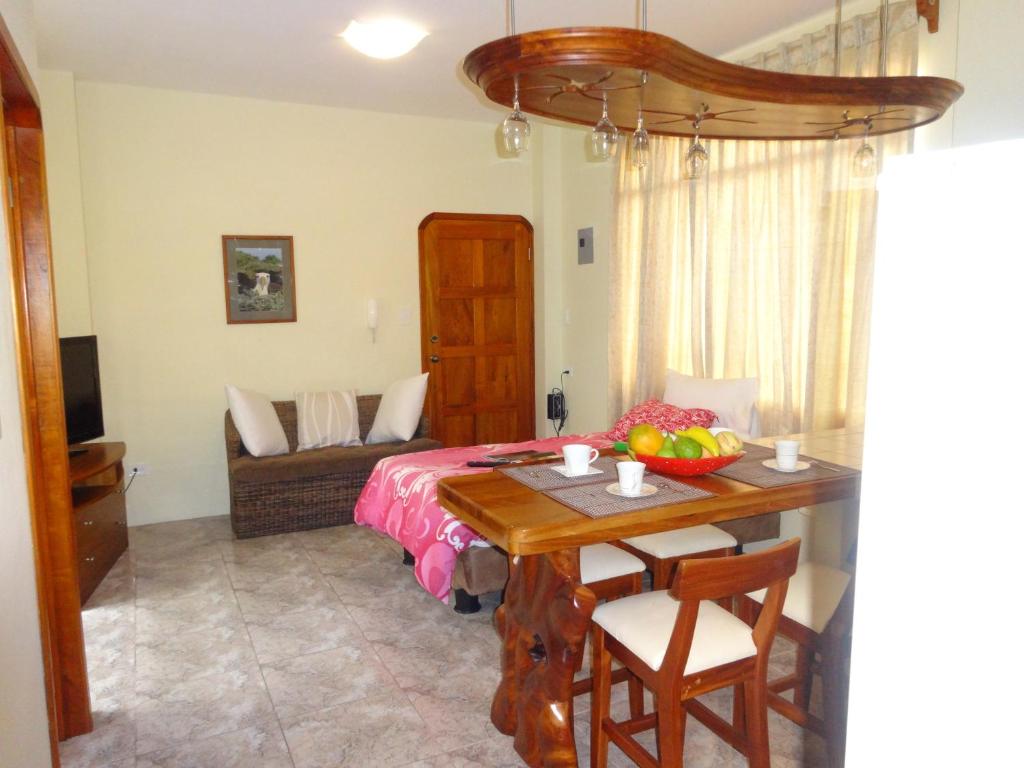 TV a/nebo společenská místnost v ubytování Hotel Del Sol Galapagos