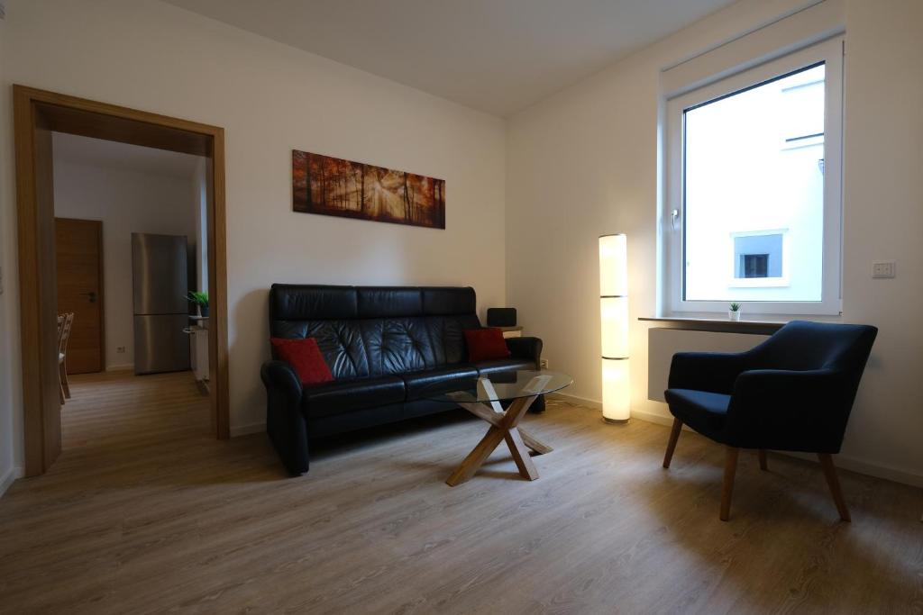 Posezení v ubytování Modern Home Check-in & chill down auf 65 qm²
