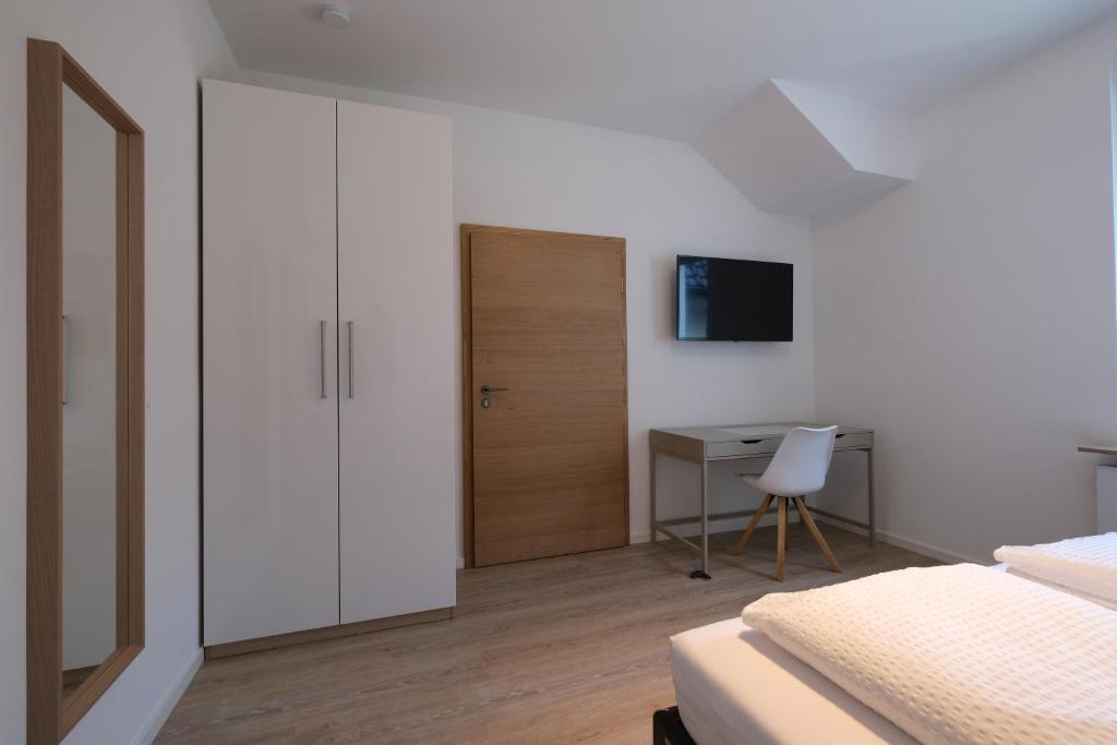 Postel nebo postele na pokoji v ubytování Modern Home Check-in & chill down auf 65 qm²