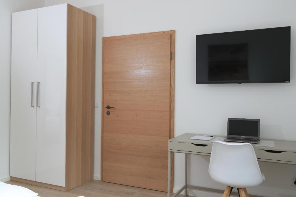 TV a/nebo společenská místnost v ubytování Modern Home Check-in & chill down auf 65 qm²