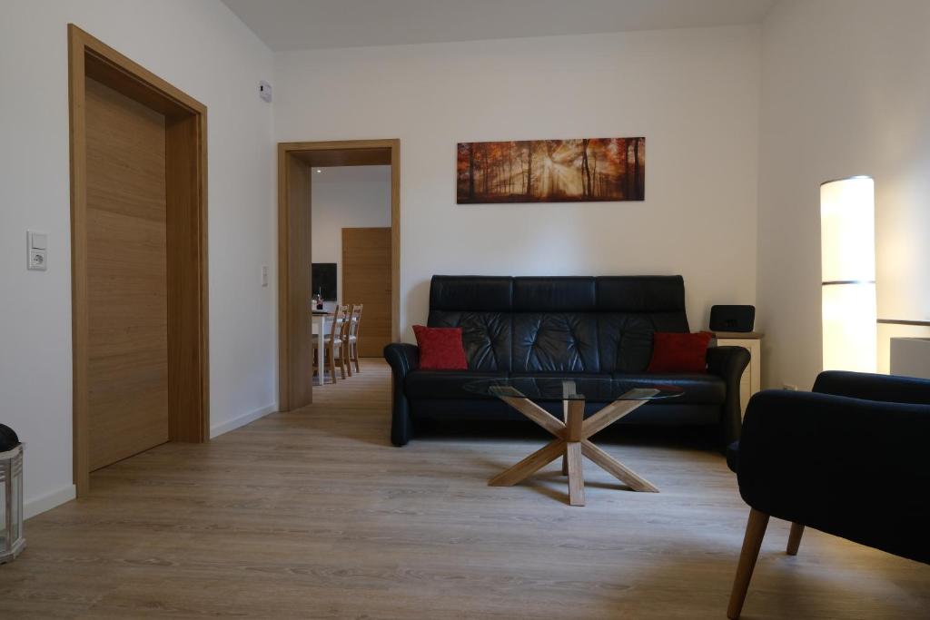 Posezení v ubytování Modern Home Check-in & chill down auf 65 qm²