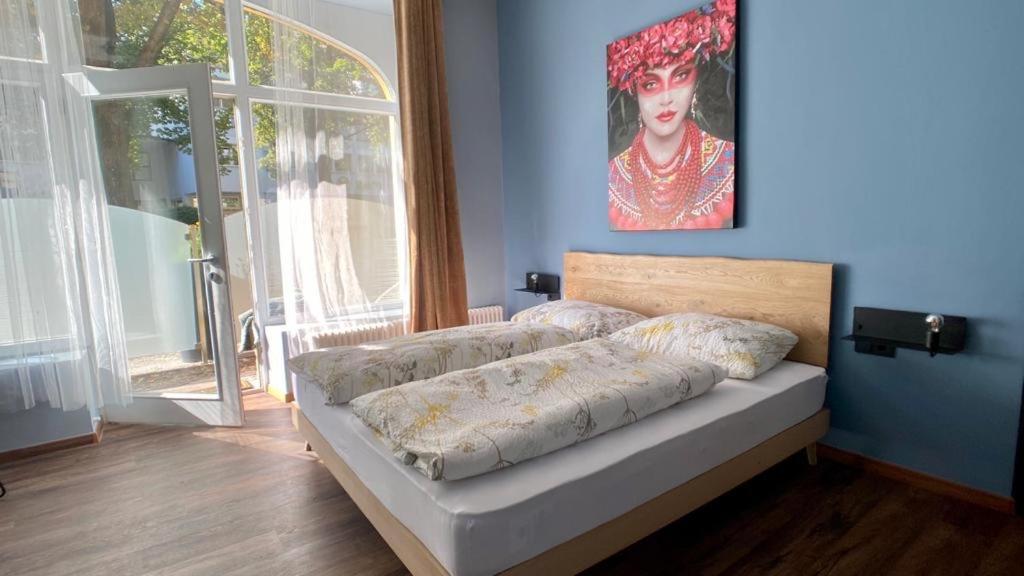 Postel nebo postele na pokoji v ubytování sleep & go -Meran easy staying